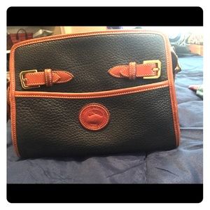 Dooney and burke all weather leather purse.